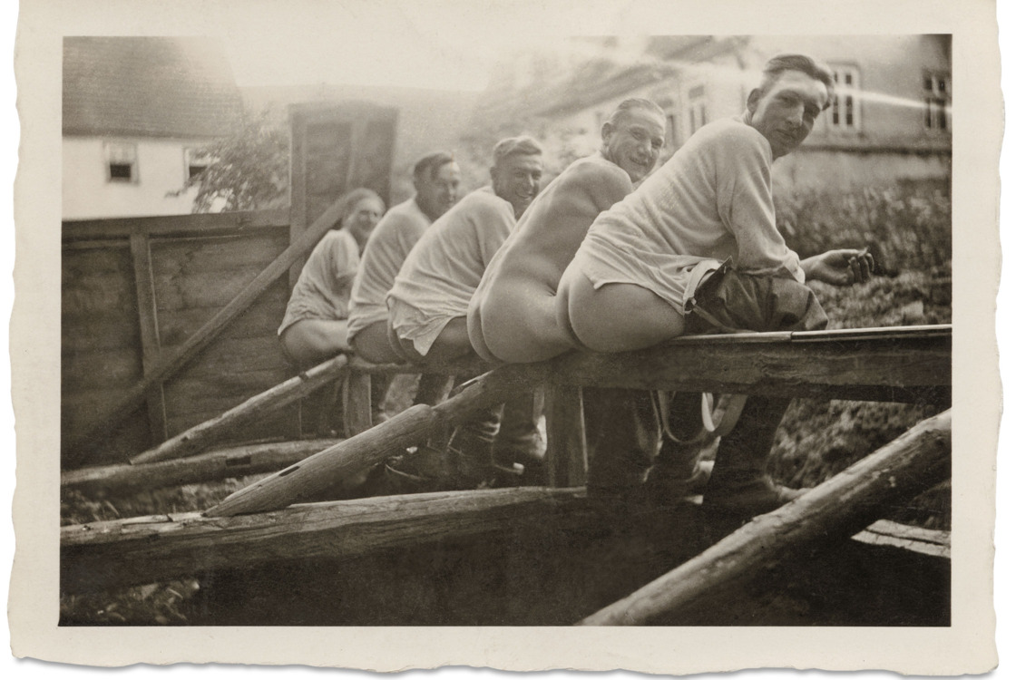 Men on latrine from the book “My Buddy. World War II Laid Bar