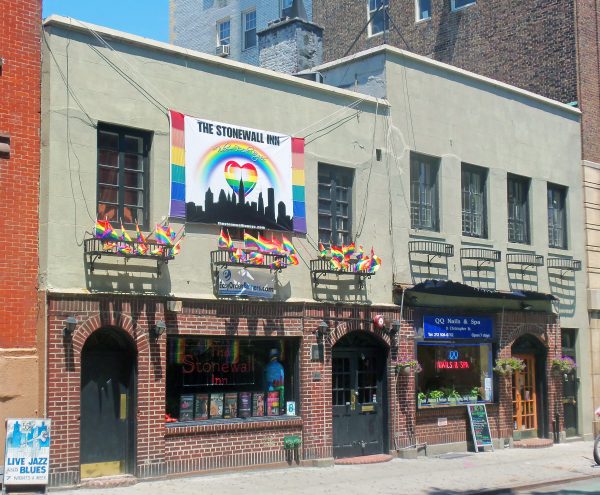 Stonewall_Inn_2012_with_gay-pride_flags_and_banner