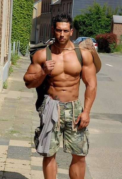 shirtless-twink-hunk-latino-gay-rucksack-ripped-muscle-hairless-chest-nude-torso-shorts-bulge-army-style-tattoo