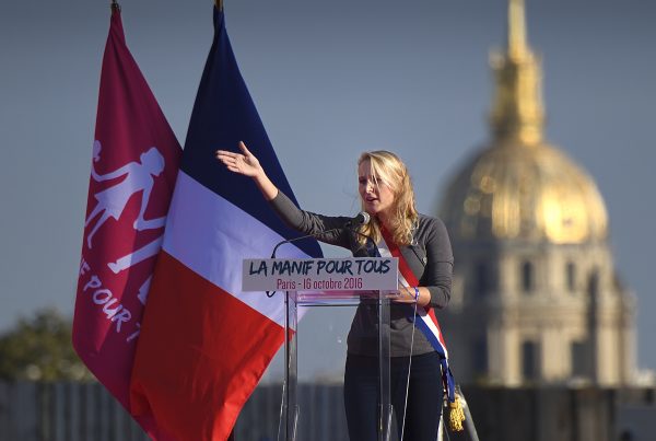 French far-right Front National (National Front - FN) Parliament member Marion Marechal Le Pen delivers a speech during a demonstration organised by the movement 'La Manif pour tous' against what are seen as 'new offensives against the family and education', on the Trocadero, next to the Invalides, in Paris on October 16, 2016. / AFP PHOTO / Eric FEFERBERG